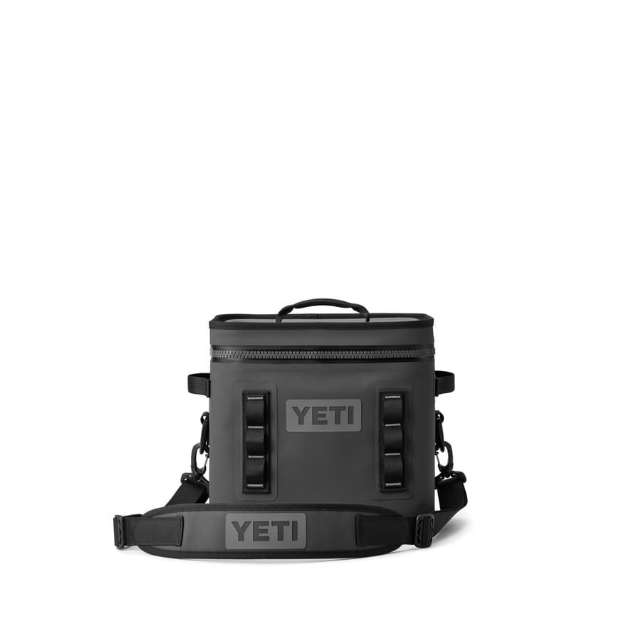 Charcoal YETI Hopper Flip 12 soft cooler with a shoulder strap
