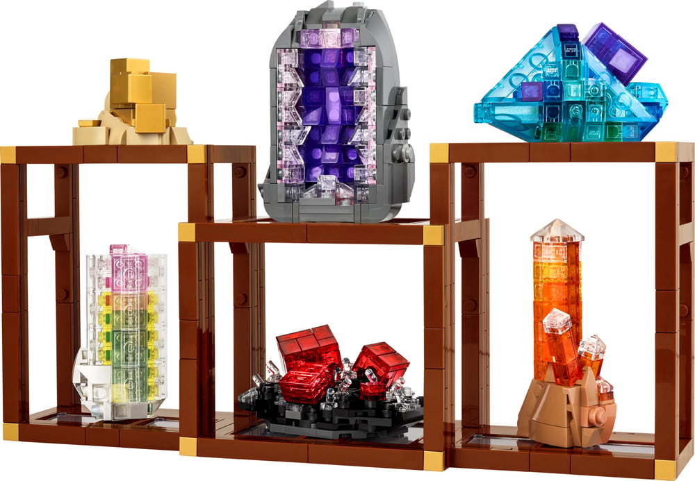Six colorful brick-built mineral specimens on three black display shelves