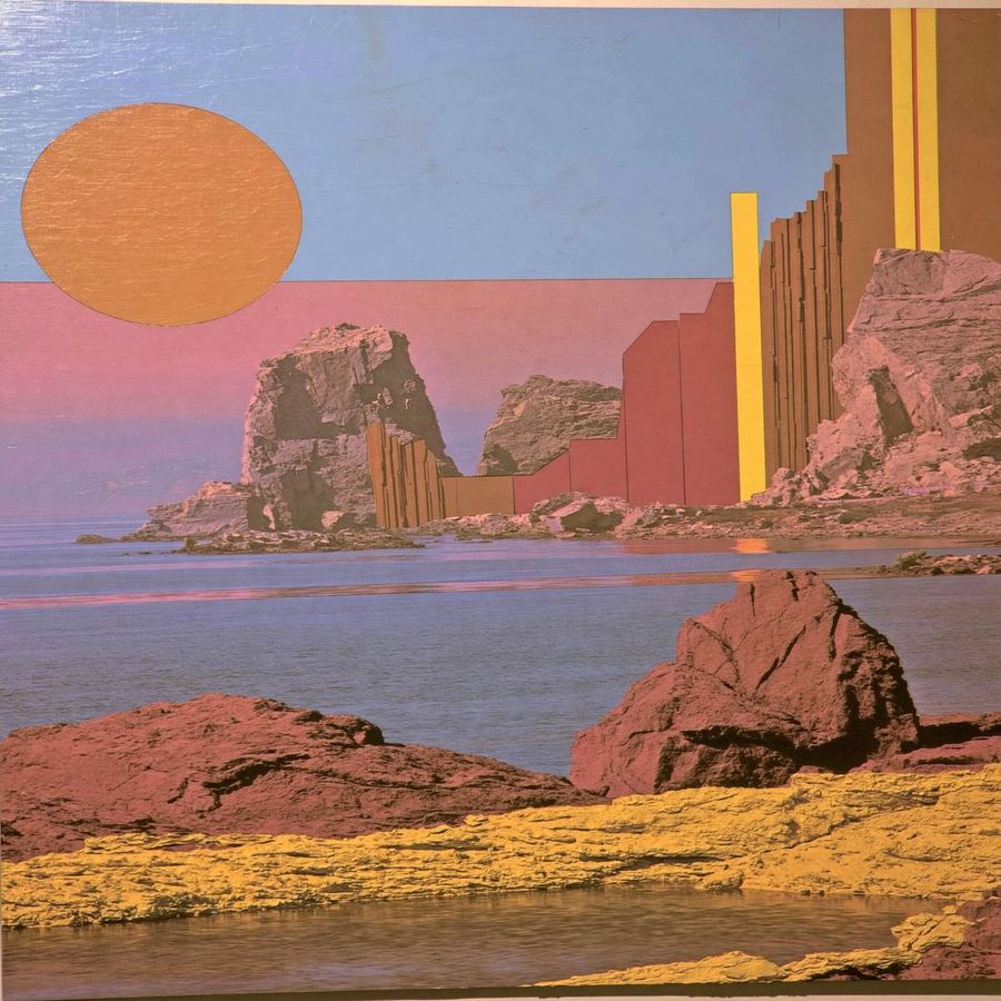Dusty orange sun over quiet sea-stack cliffs