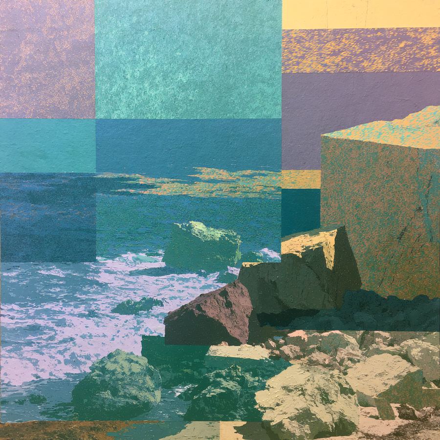 Pale quilt of rock and sand at the waterline